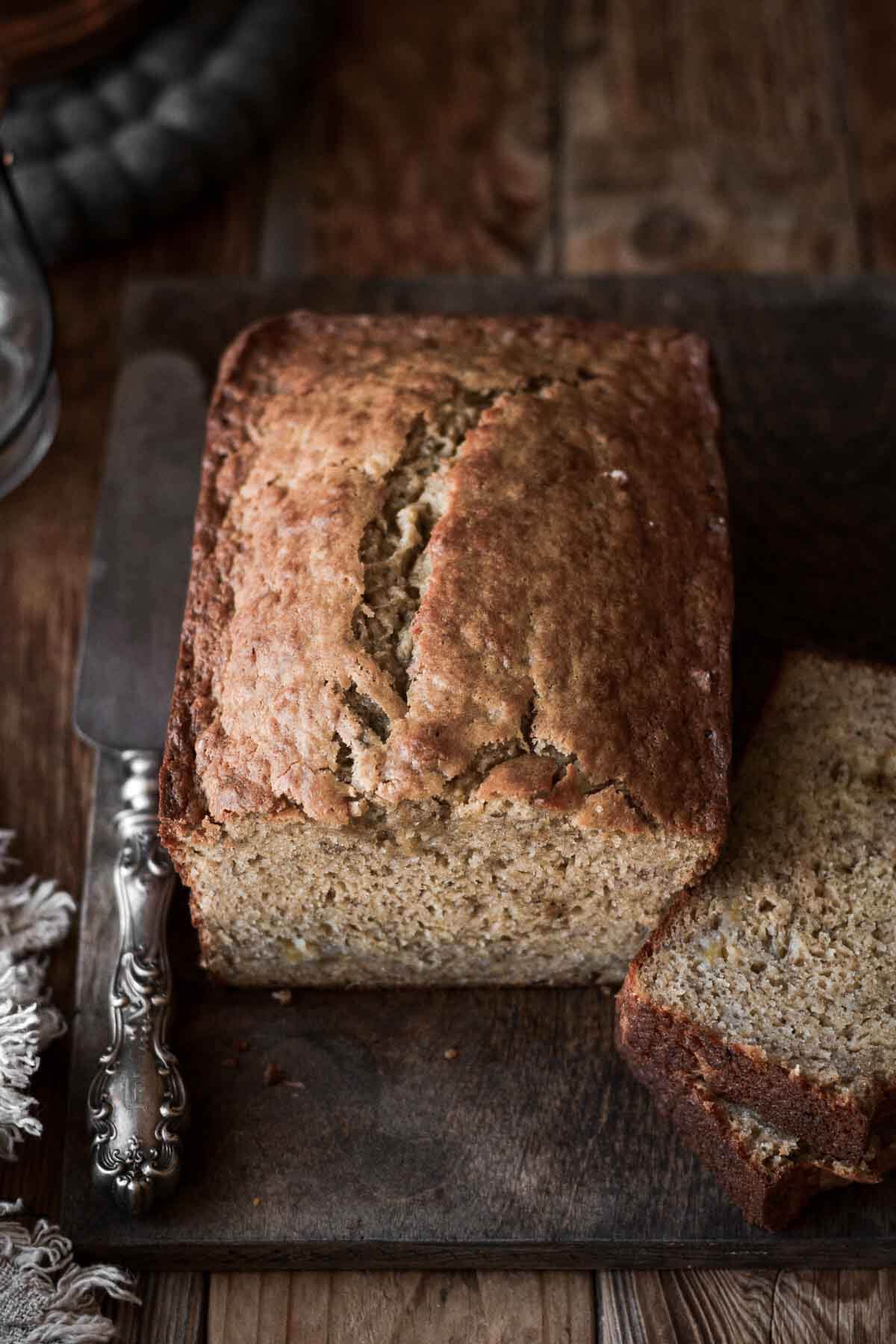 Banana bread on a cutting board.