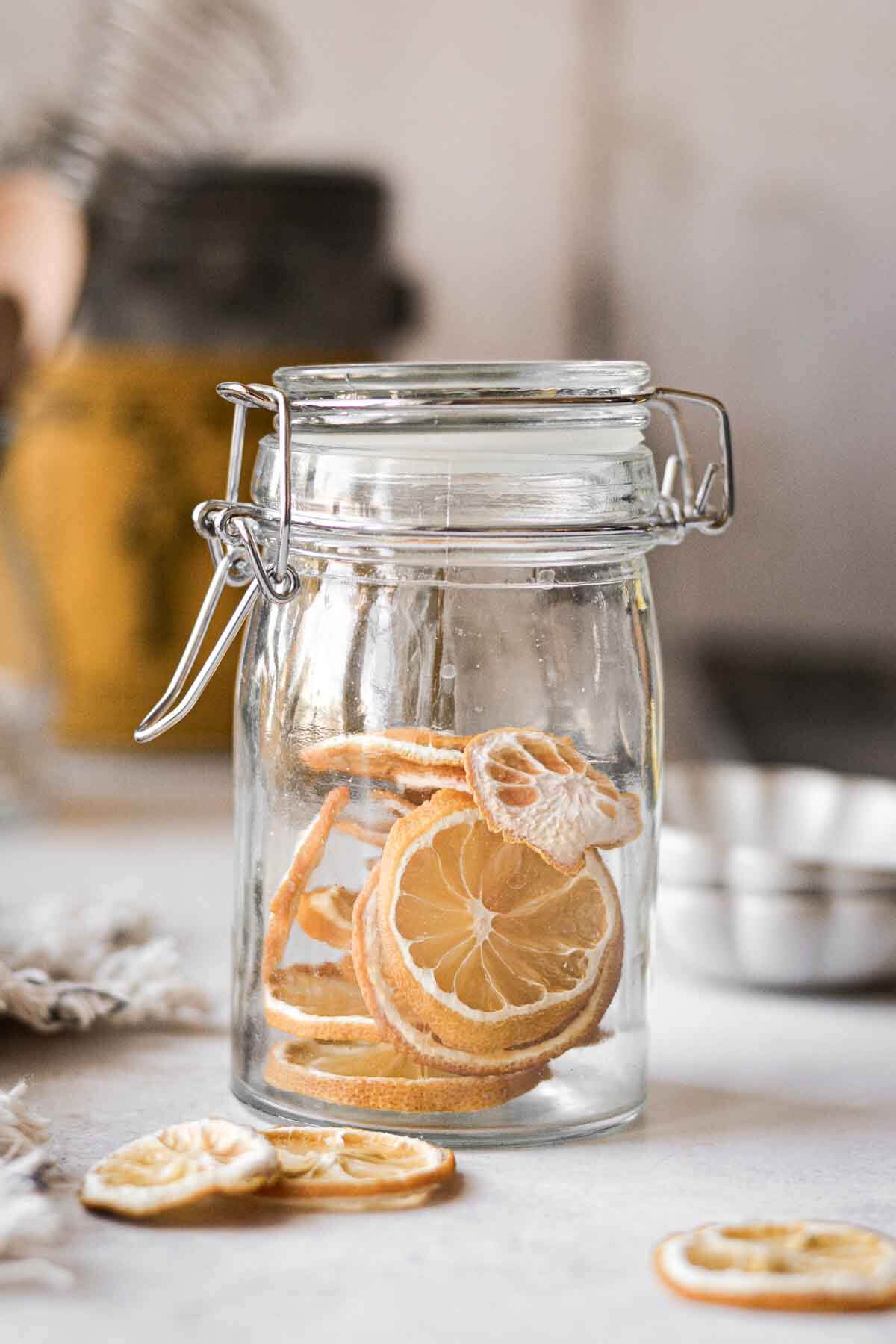 Dried lemon slices in a glass jar.