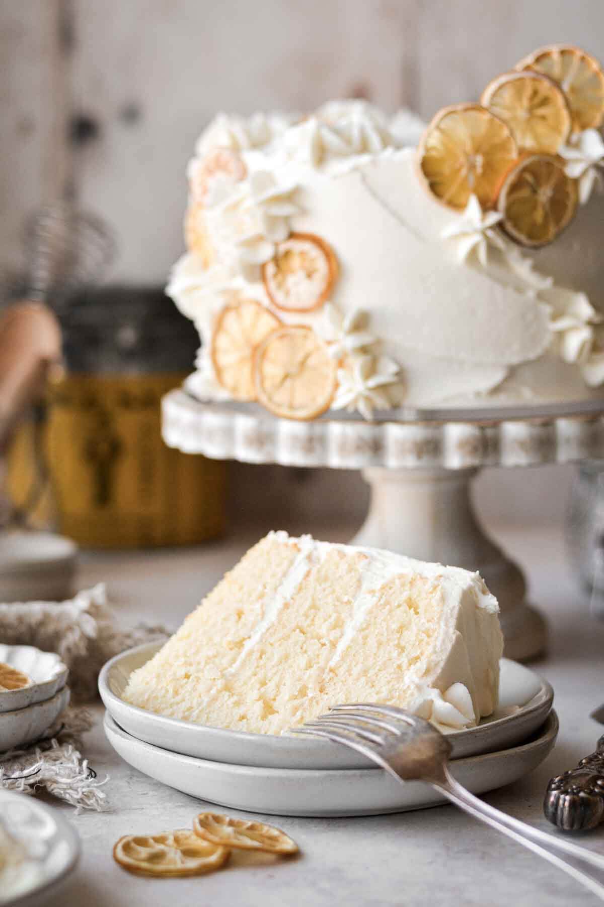 Slice of lemon cake on a plate.