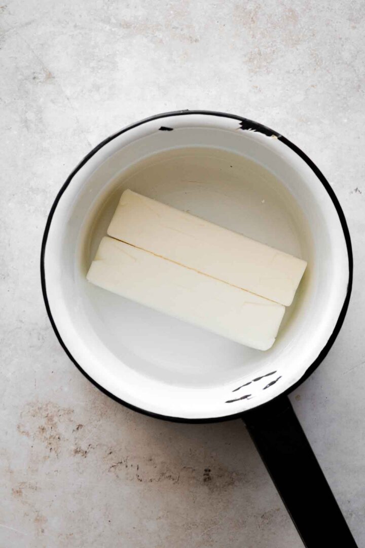 Step 2 for making white Texas sheet cake.