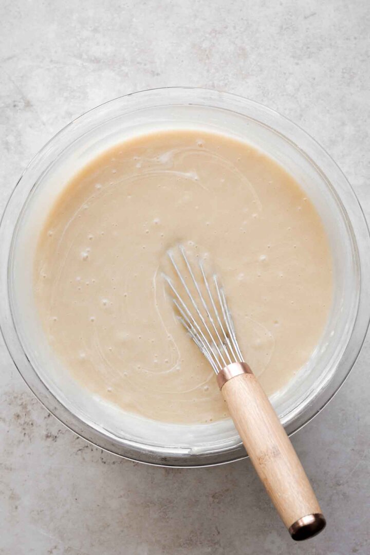 Step 6 for making white Texas sheet cake.