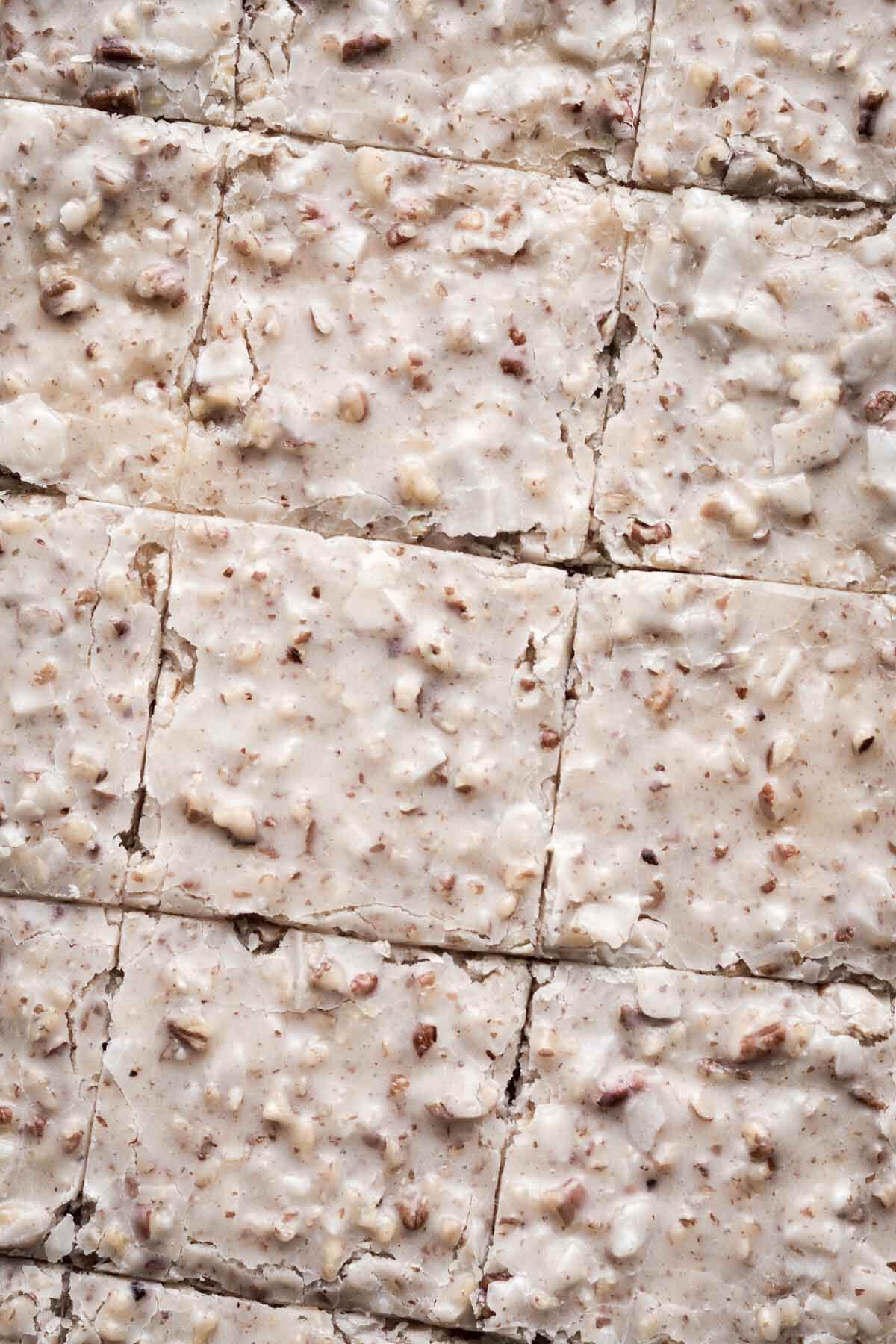 White Texas sheet cake with butter pecan coconut icing.