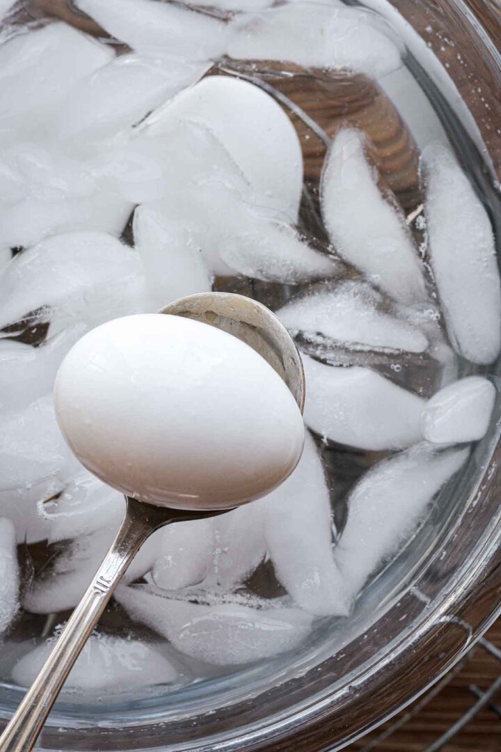 Hard boiled eggs in an ice water bath.