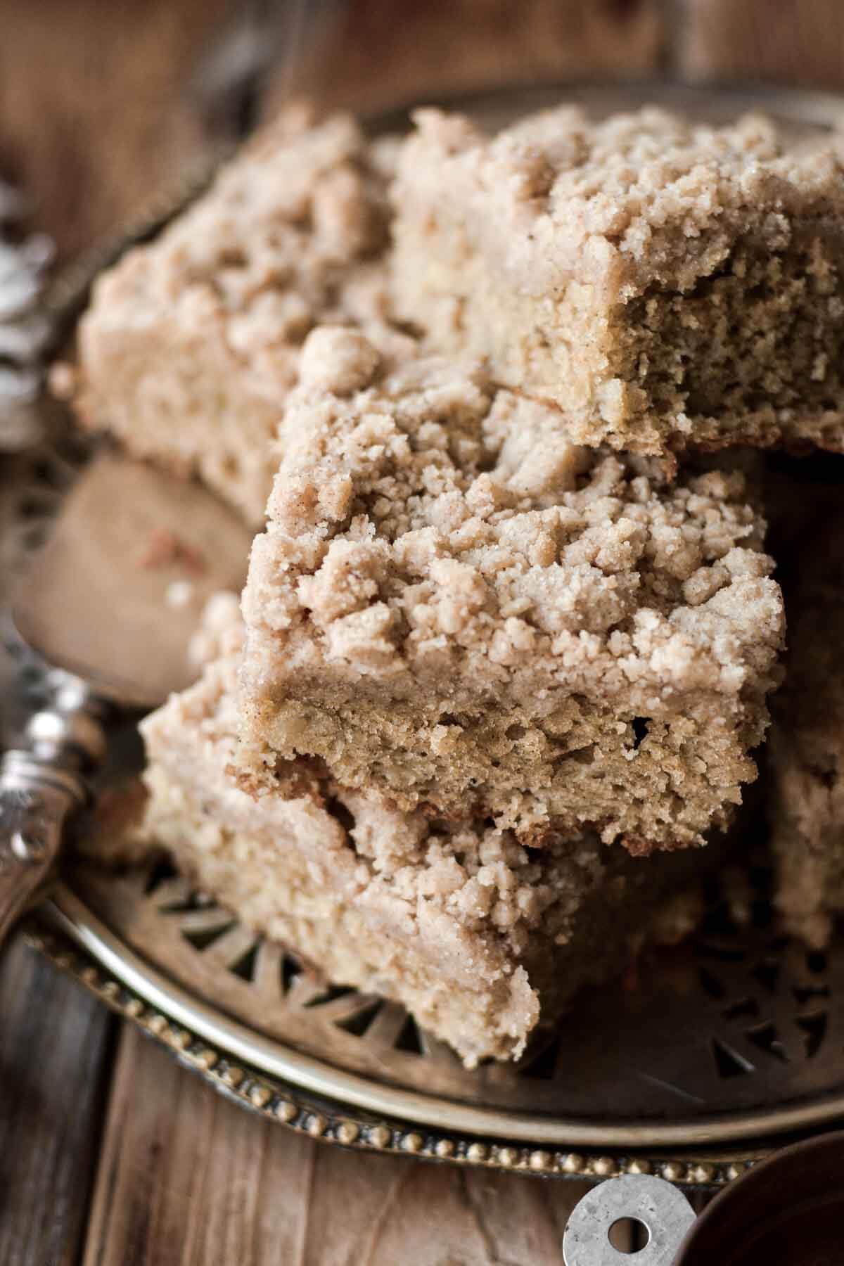 Banana bread crumb cake cut into squares.