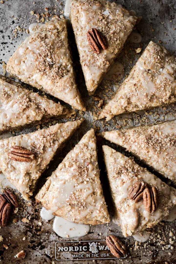 Maple scones with maple icing and chopped pecans.
