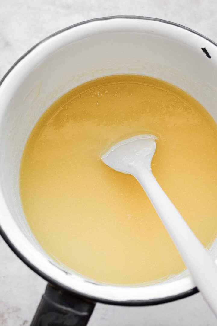 Step 2 for making white chocolate brownies.