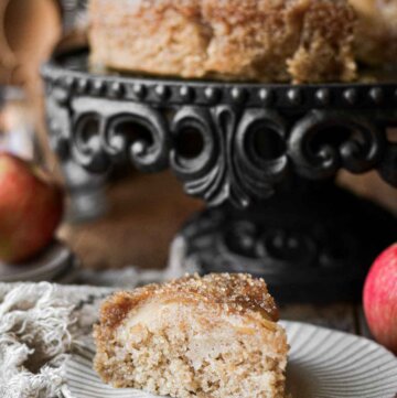 Apple upside down cake with one slice cut.