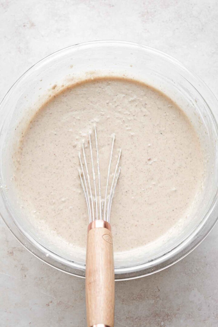 Step 6 for making walnut pancakes - whisking the batter.