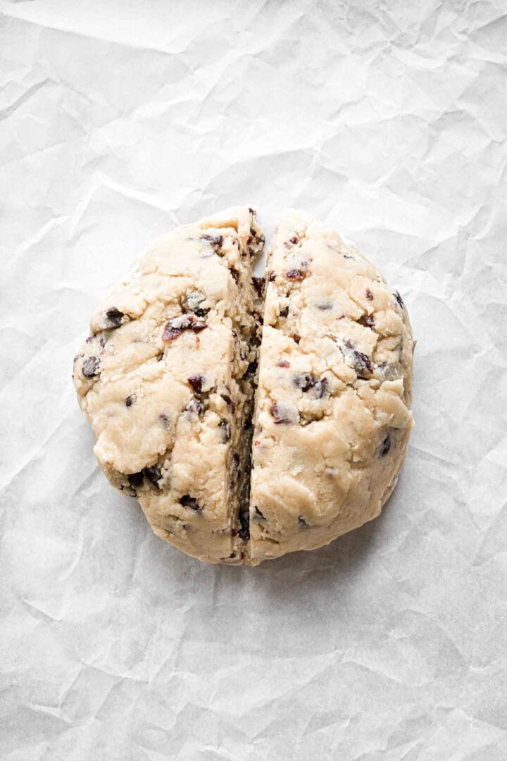 Step 5 for making cherry chocolate chip biscotti - dividing dough in half.