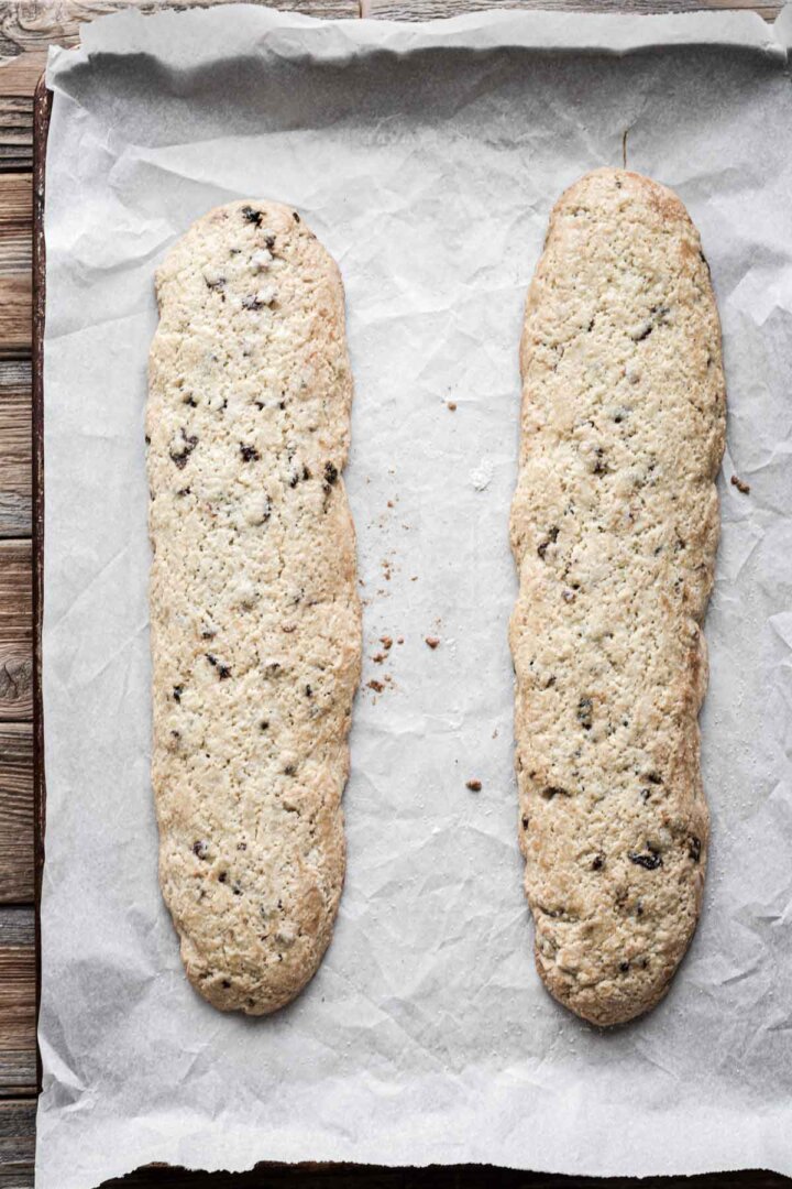 Step 7 for making cherry chocolate chip biscotti - baked dough.