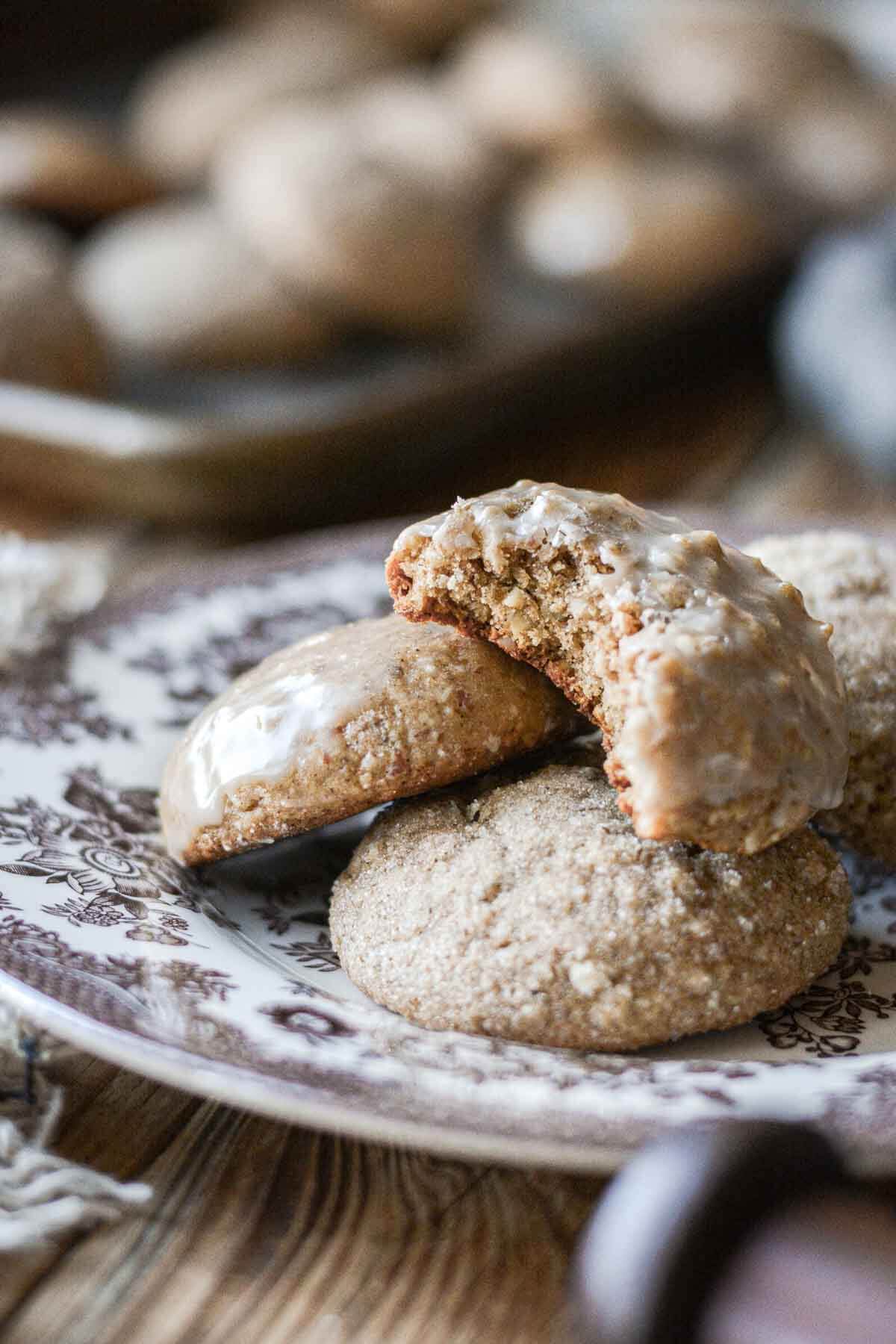 Lebkuchen cookies, one with a bite taken.