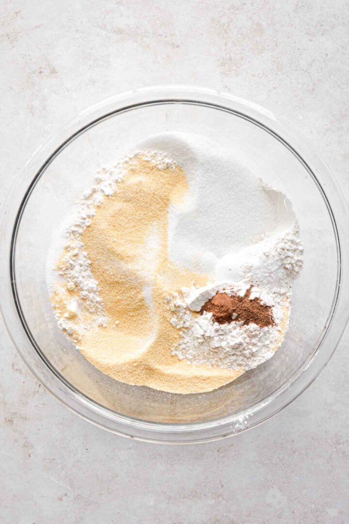 Step 1 for making apple cornbread crumb cake - bowl of dry ingredients.