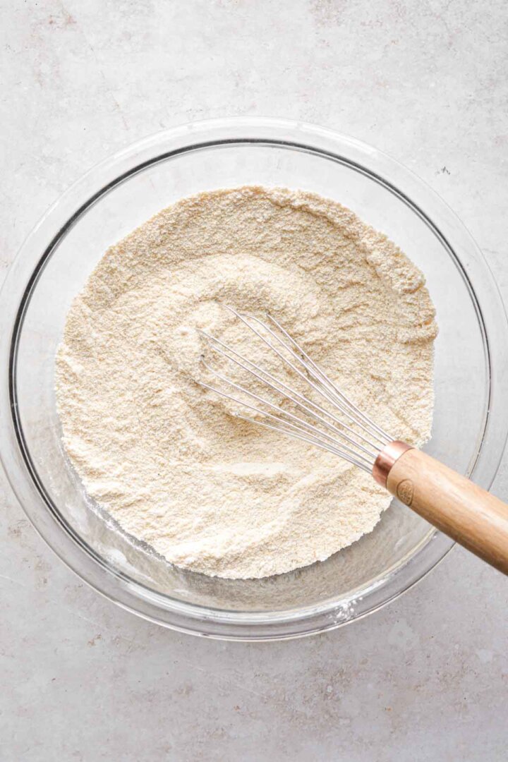 Step 2 for making apple cornbread crumb cake - mixing dry ingredients.