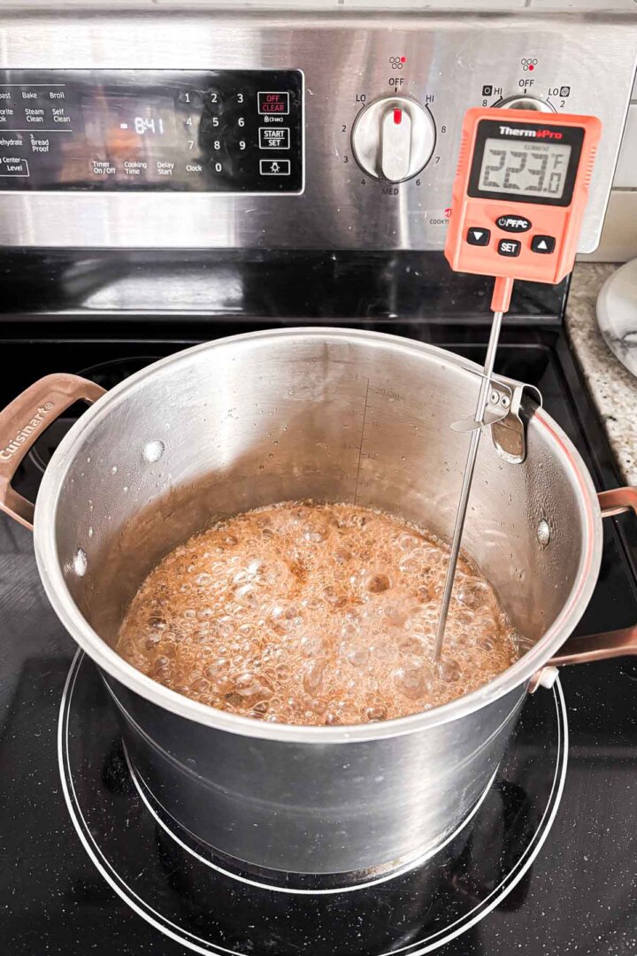 Step 3 for making penuche fudge - boiling sugar and milk to 223 degrees.