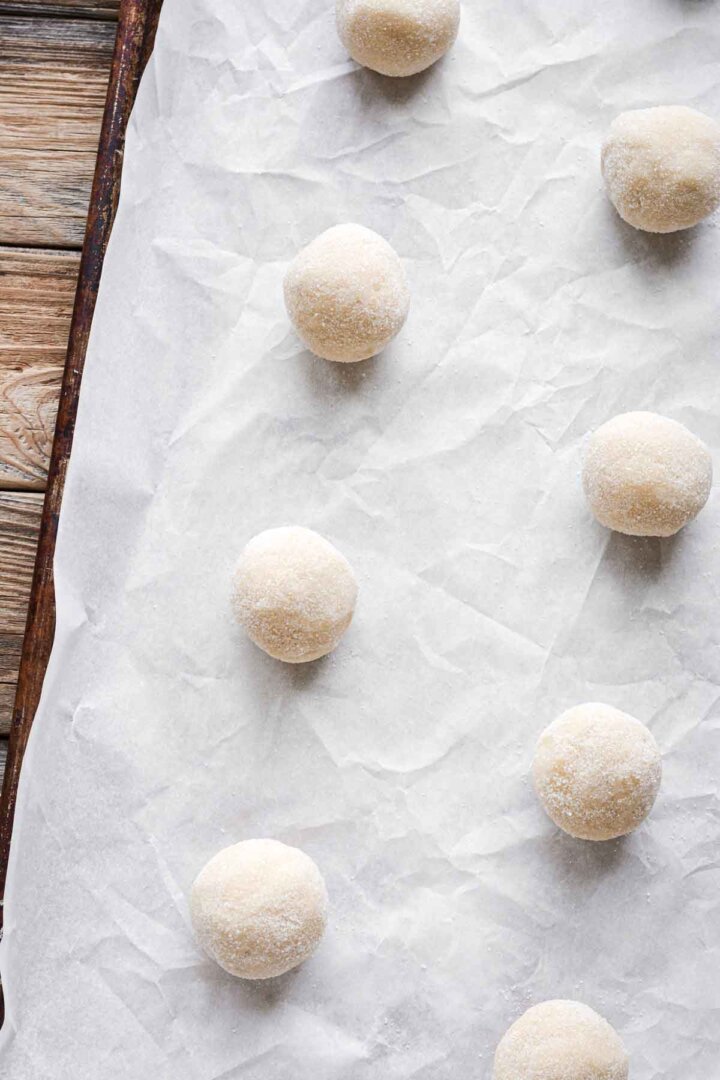Step 1 for making pumpkin pie cookies - cookie dough rolled into balls.
