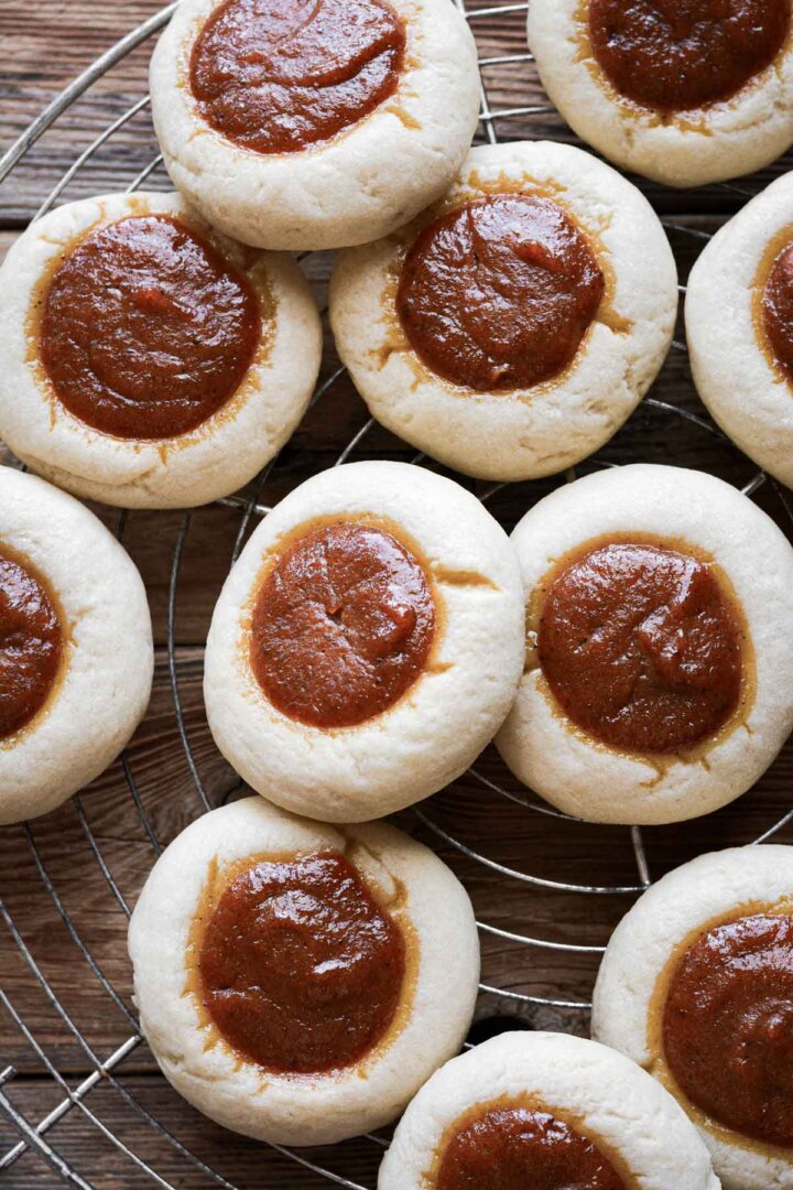 Step 8 for making pumpkin pie cookies - baked cookies on a cooling rack.