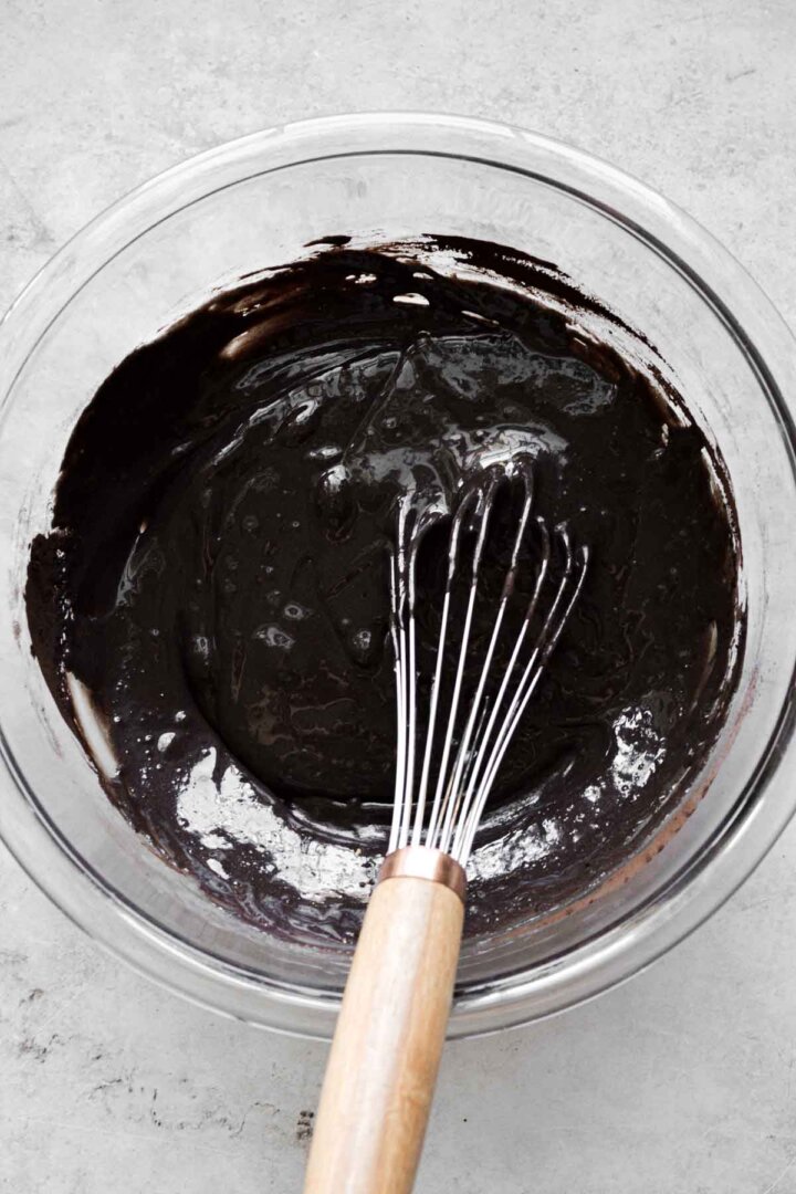 Step 2 for making chocolate peppermint ice cream - whisking the chocolate base.