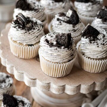 Cookies and cream cupcakes on a cake stand.