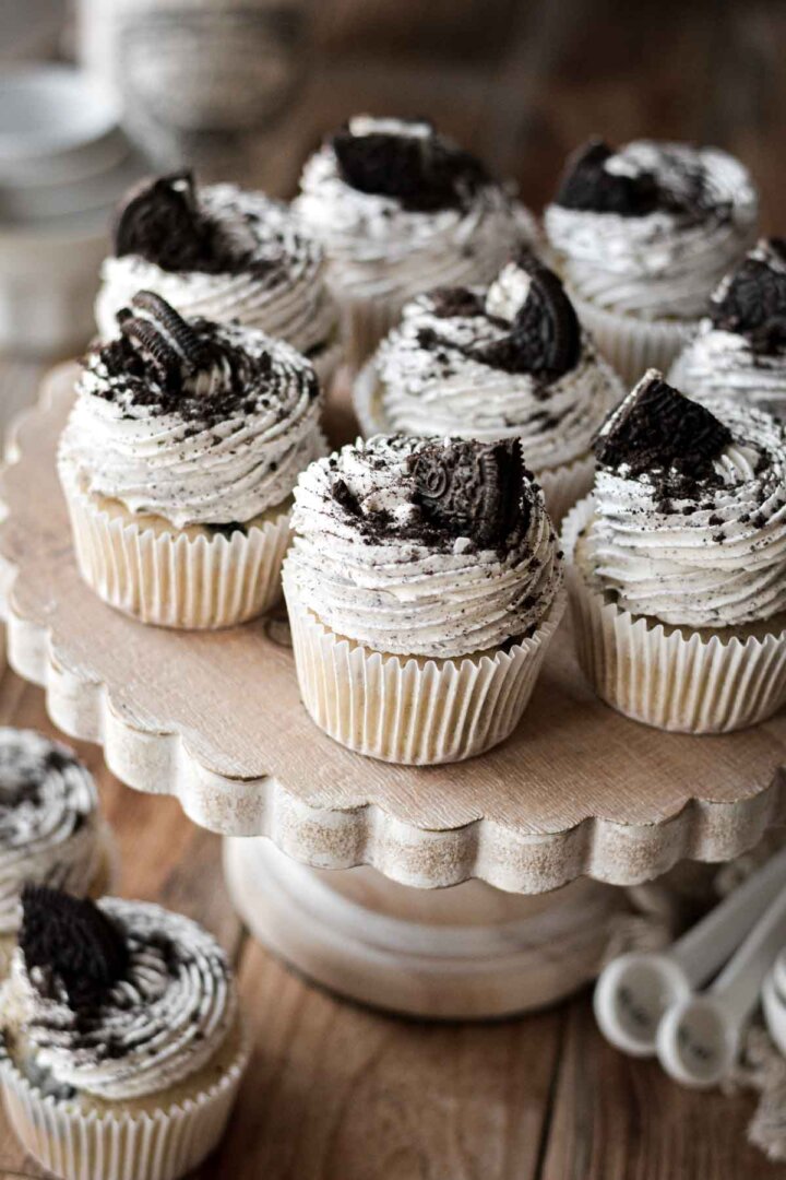 Cookies and cream cupcakes on a cake stand.