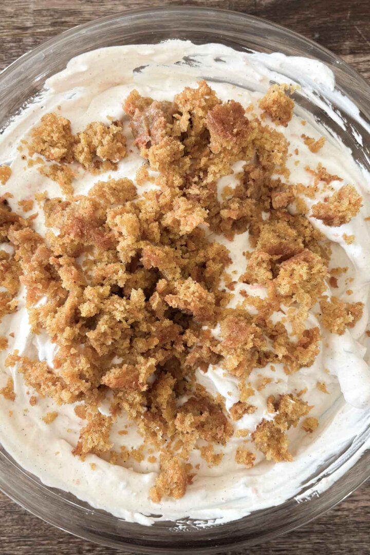 Step 6 for making carrot cake ice cream - adding crumbled cake.