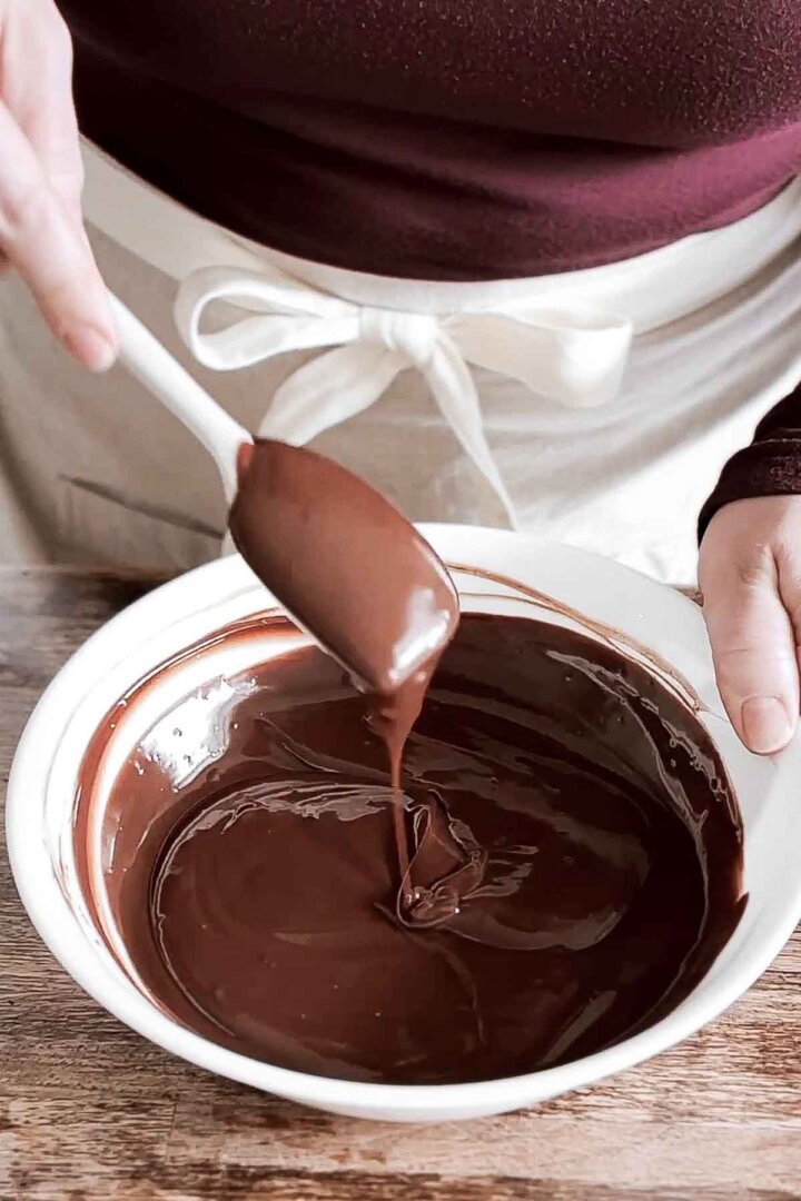 Stirring chocolate ganache.