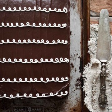 Chocolate hostess sheet cake on a baking sheet.