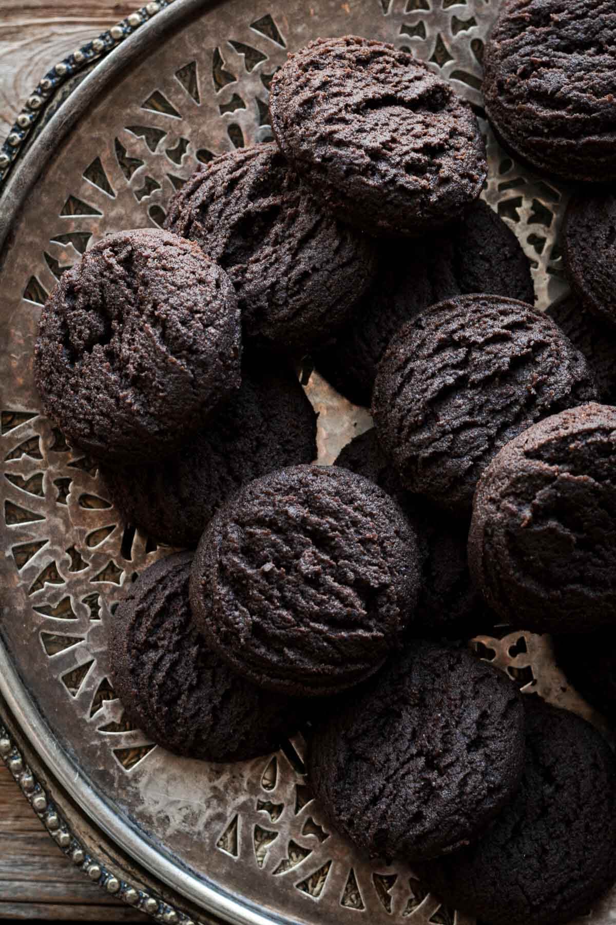 Chocolate Swedish dream cookies on a silver plate.