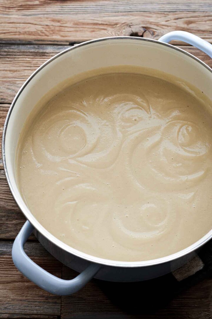 Pot of creamy parsnip soup.