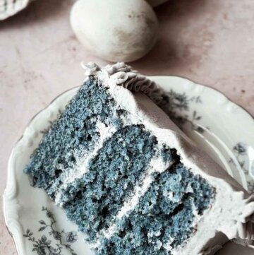 Slice of blue butterfly pea flower cake.