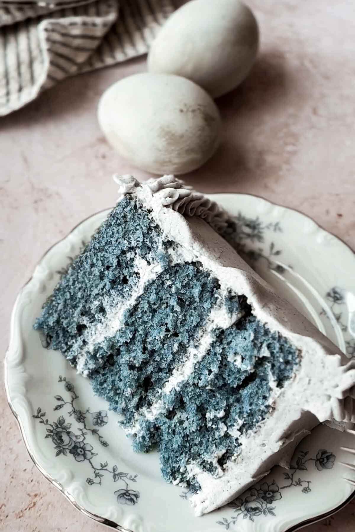 Slice of blue butterfly pea flower cake.