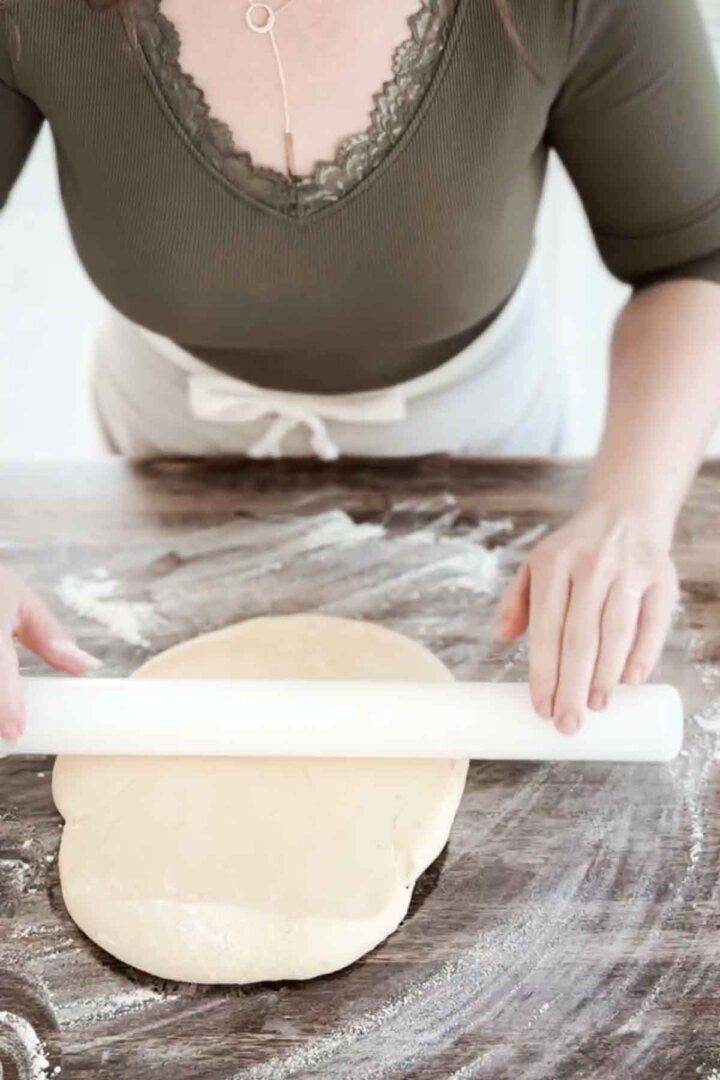 Step 1 for making Easter bread - rolling out dough.