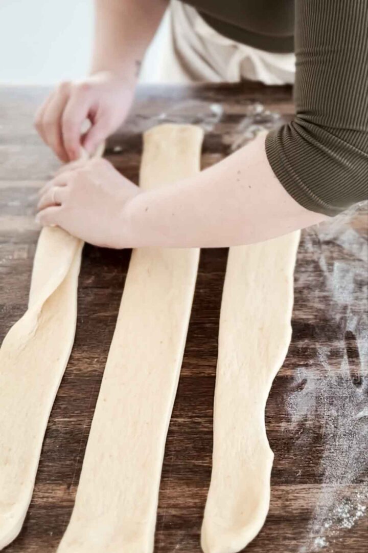 Step 3 for making Easter bread - folding dough.
