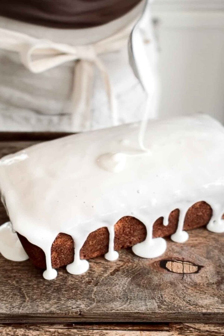 Lemon icing drizzled over lemon bread.