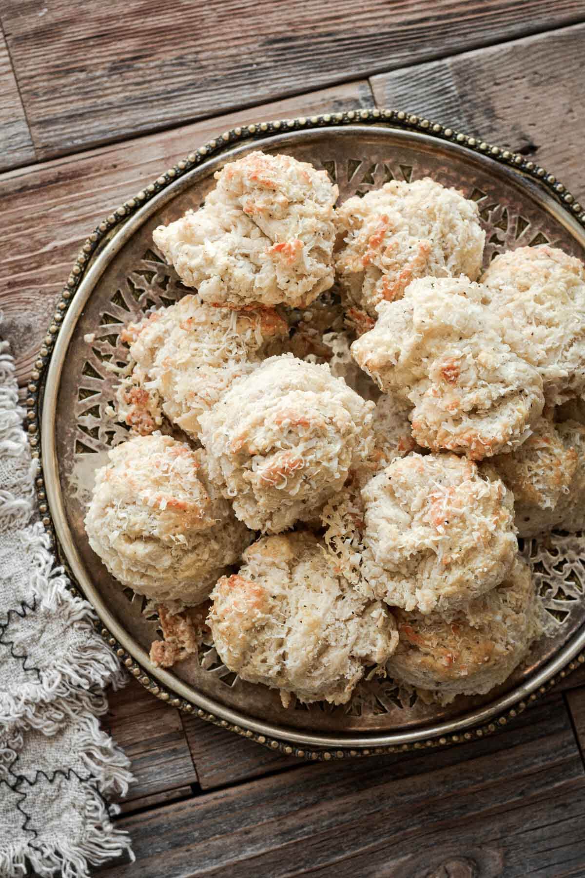 Parmesan pepper drop biscuits on a vintage plate.
