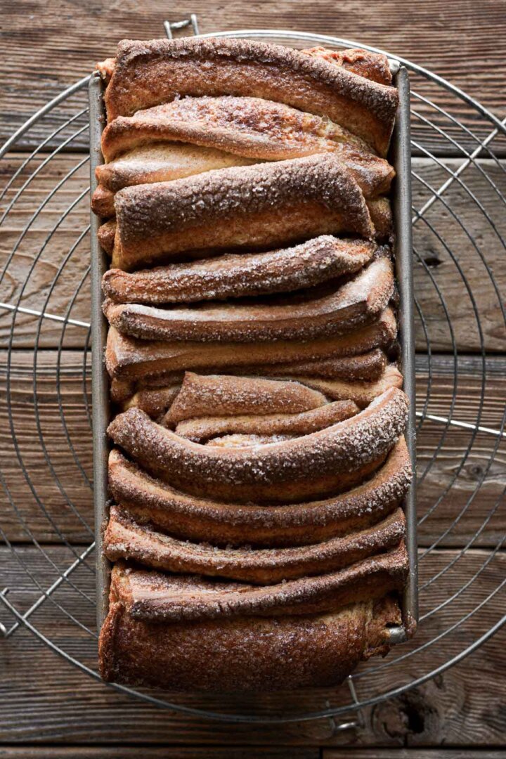 Just baked cinnamon sugar pull apart bread in a pan.
