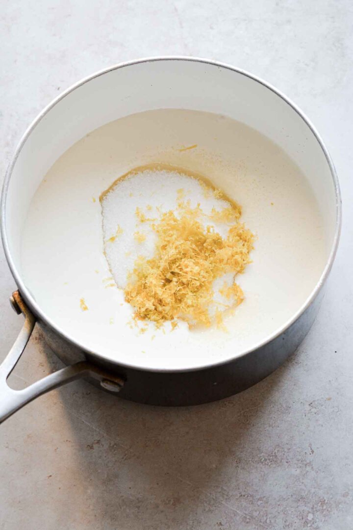 Step 1 for making lemon posset: combining cream, sugar and lemon zest.