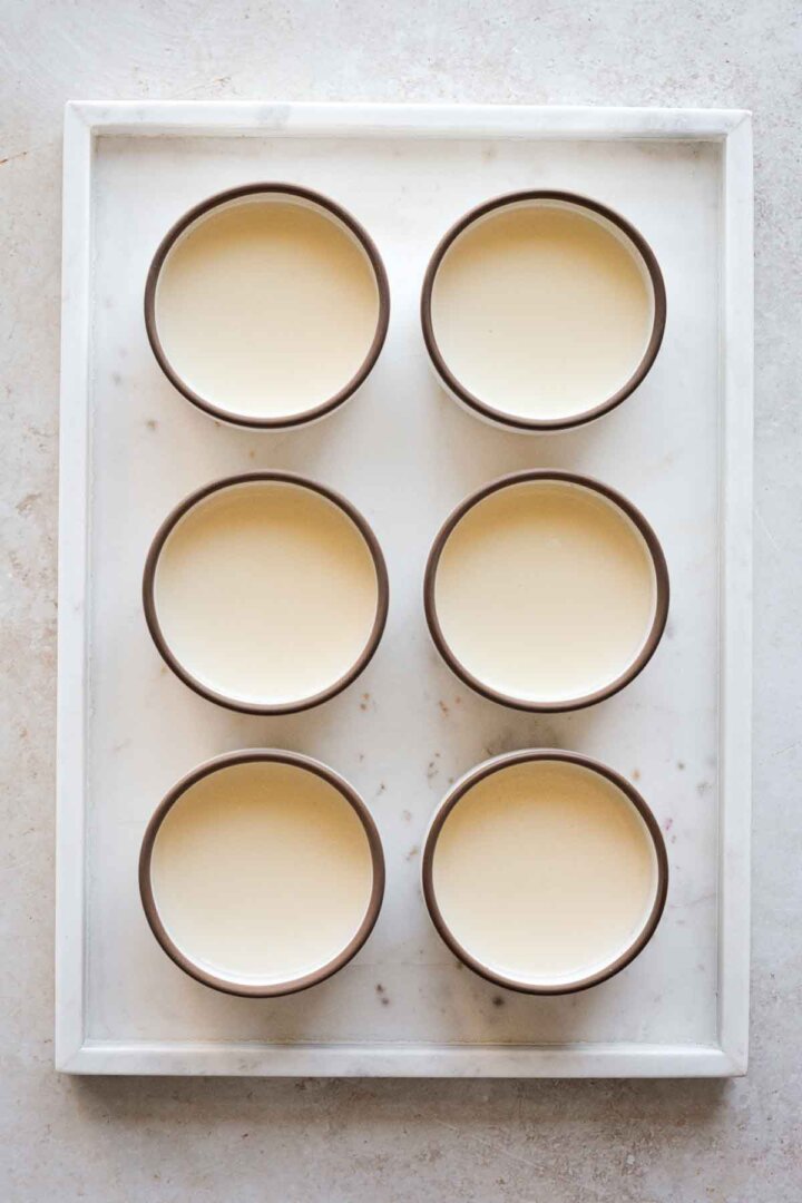 Lemon posset in six ramekins.