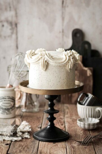London fog layer cake, on a black and gold cake stand.