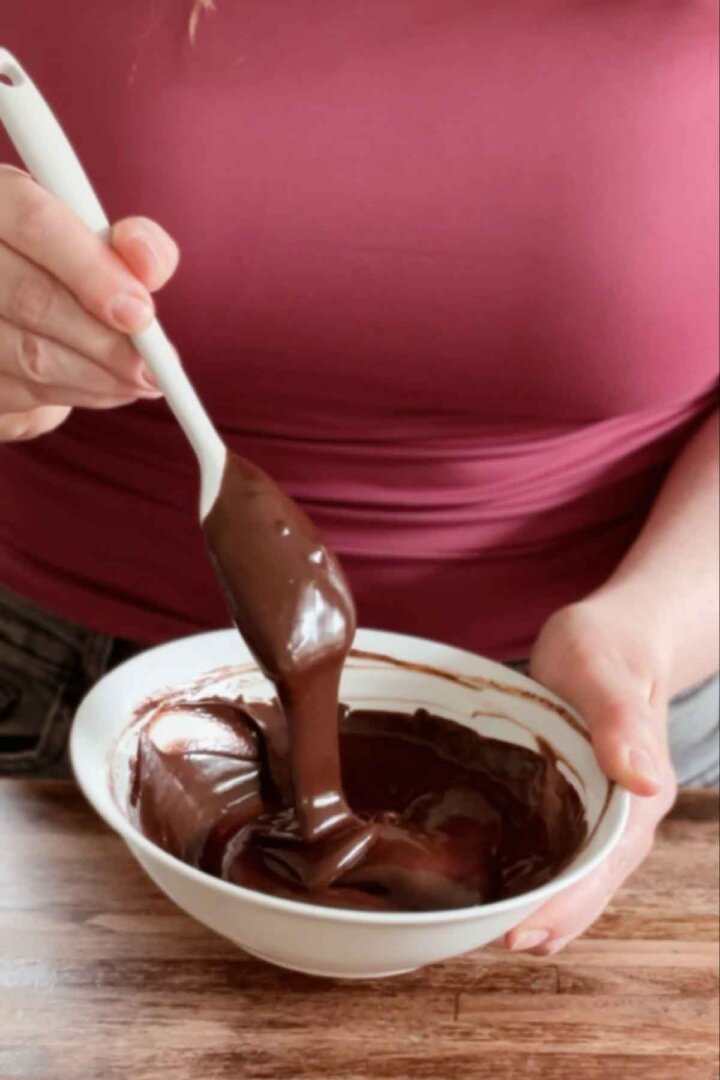 Stirring a bowl of ganache.