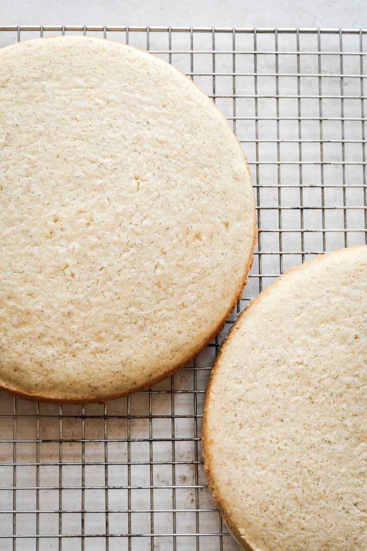 Chamomile vanilla cakes on a cooling rack.