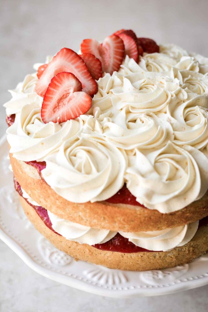 Chamomile cake, layered with strawberry rhubarb compote and honey orange buttercream.
