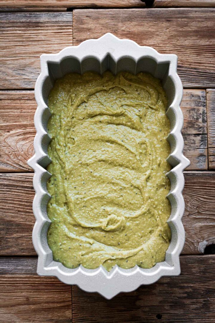 Matcha cake batter in a loaf pan.