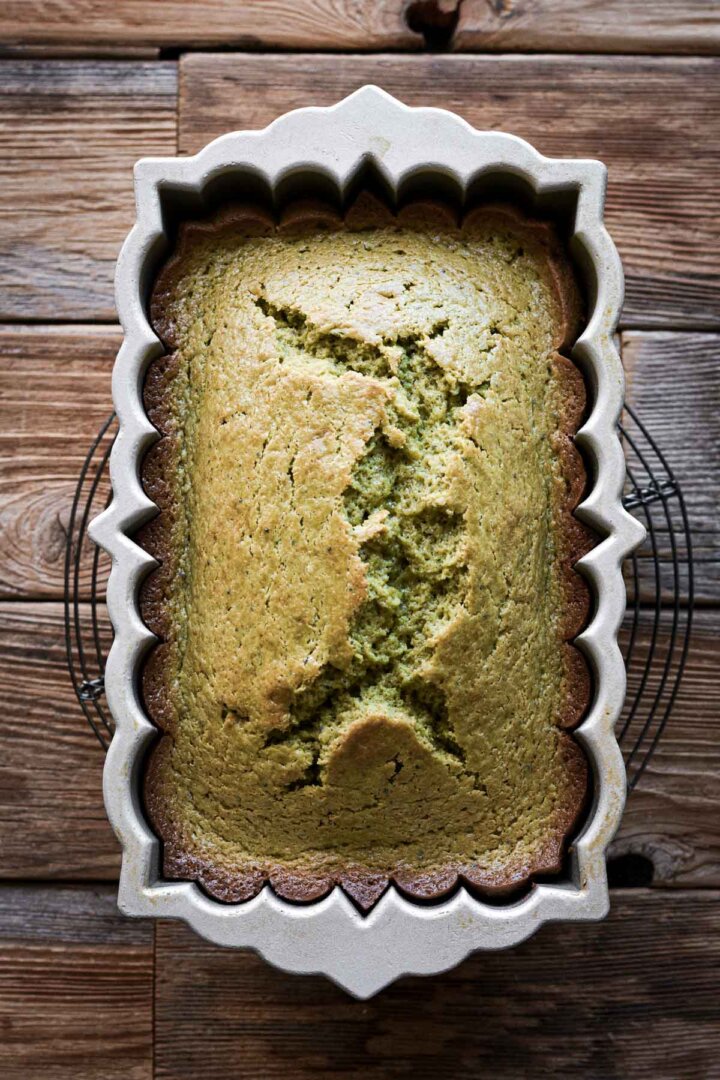 Matcha cake baked in a fluted loaf pan.