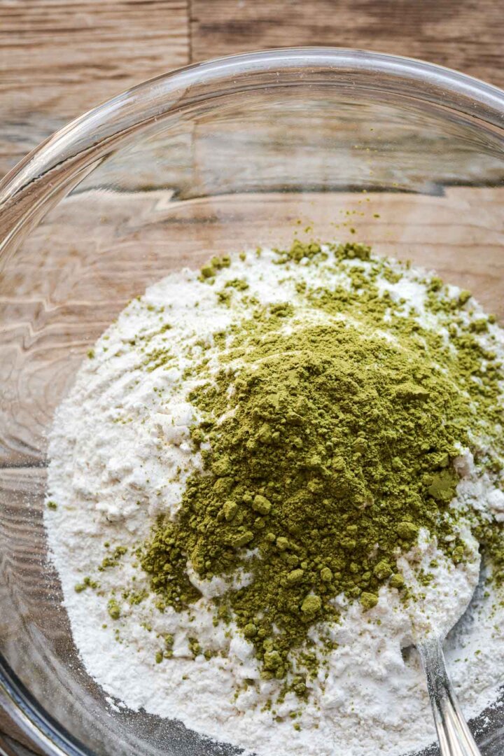 Step 3 for making matcha chocolate chip cookies - adding dry ingredients.