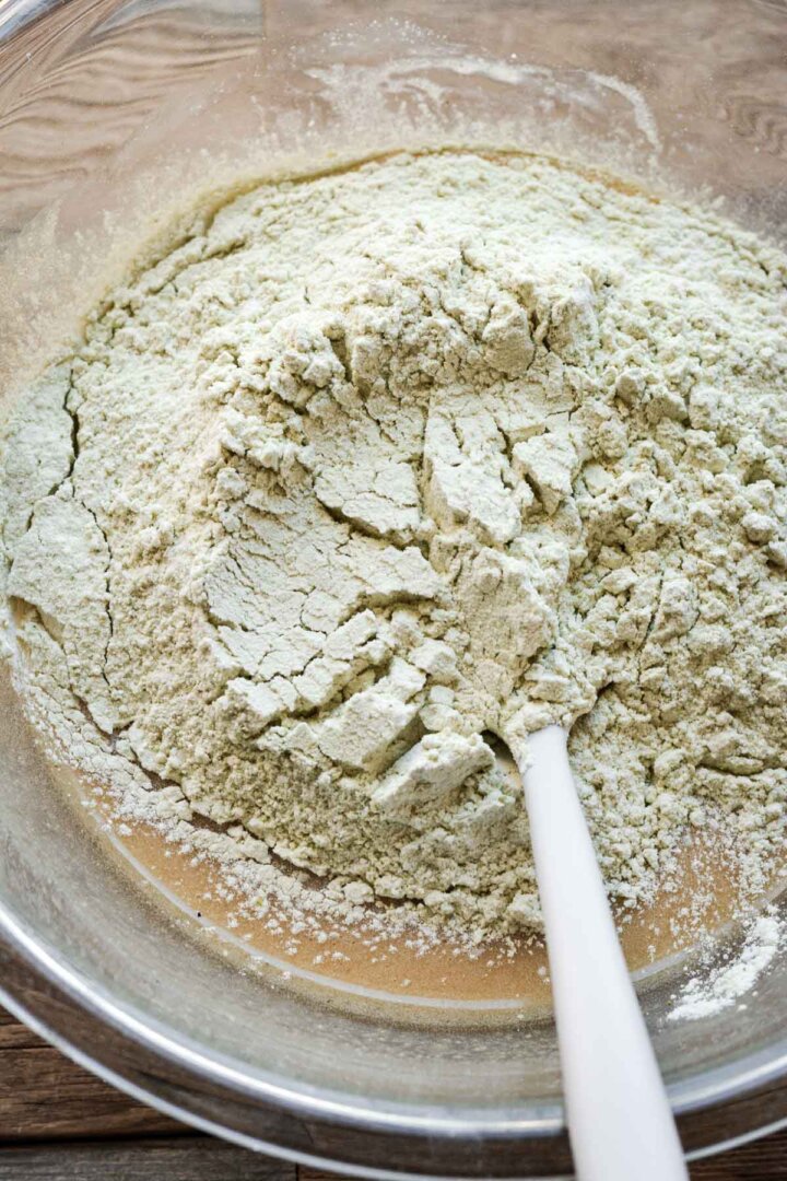 Step 4 for making matcha chocolate chip cookies - adding dry ingredients.