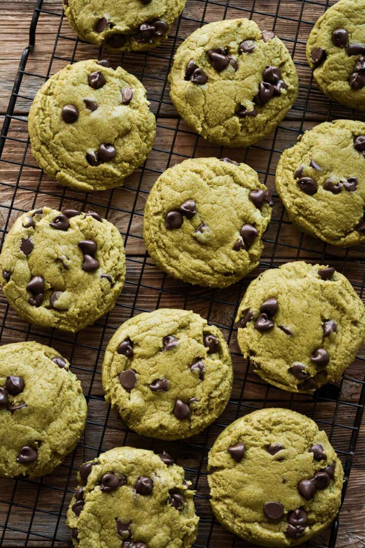 Step 9 for making matcha chocolate chip cookies - baked cookies on a cooling rack.