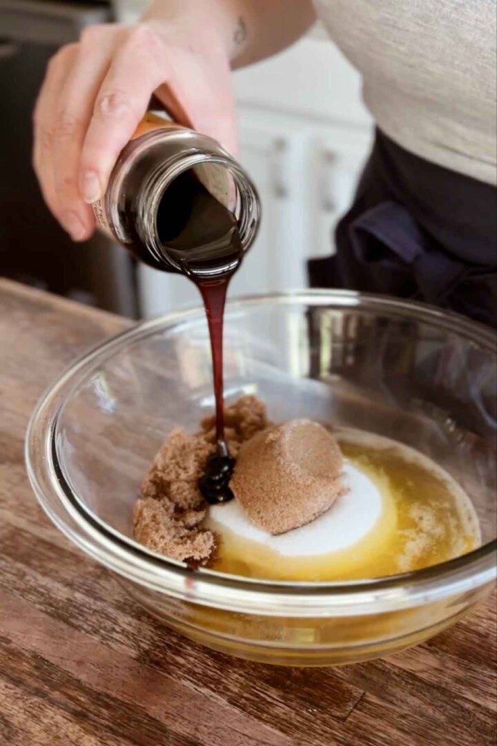 Step 1 for making oatmeal cookies - combining sugar, butter and molasses.