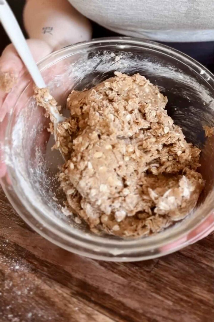 Step 5 for making oatmeal cookies - stirring the dough.