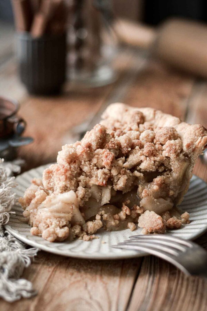 Slice of apple crumb pie.