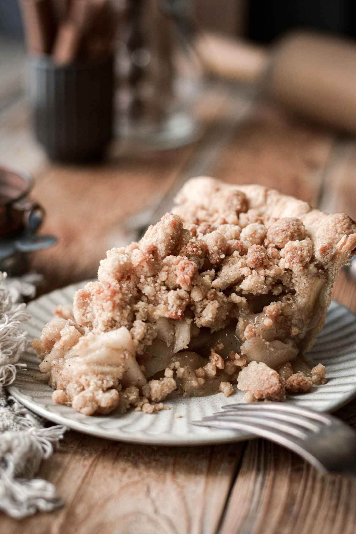 Slice of apple crumb pie.